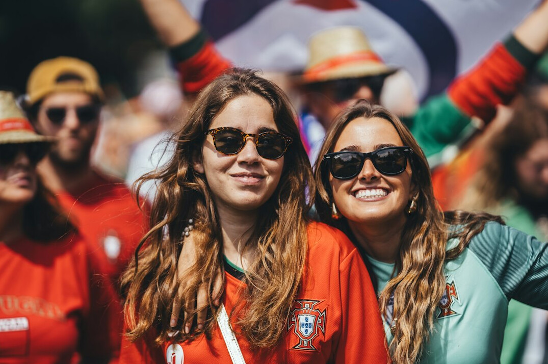 fans cheering at match